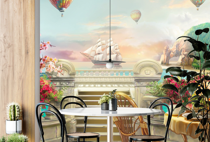 Каменная терраса с видом на парусную лодку